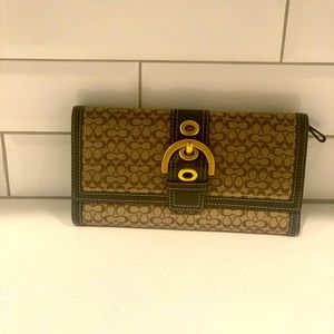 Rare print authentic Coach wallet. Downsizing have too many wallets